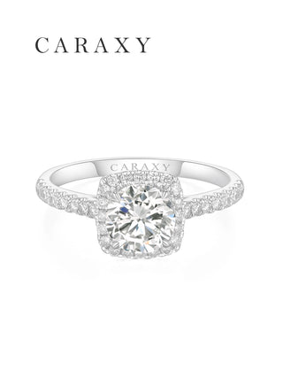 Top view of a vintage halo engagement ring with a round brilliant lab-grown diamond.
