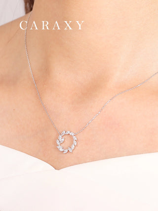 Model wearing a lab created diamond necklace featuring marquise cut stones.