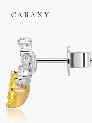 Side view of yellow and white diamond earrings in a nature-inspired stud design.