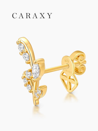 Side view of yellow gold botanical diamond earrings with a secure post backing.