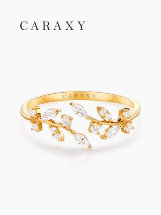 Front view of an 18K yellow gold leaf and vine open wedding band with lab grown diamonds